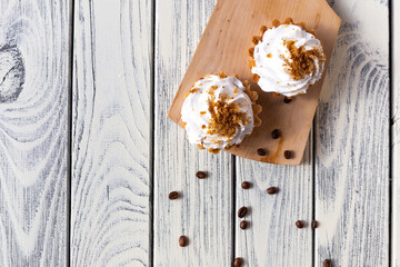 Delicious morning breakfast. Coffee with mint cakes on the background of an old white wooden countertop.