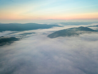 Obraz na płótnie Canvas Morning fog in the Ukrainian Carpathians. Aerial drone view.