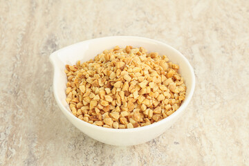 Crunched roasted peanut in the bowl