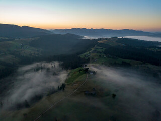 Morning fog in the Ukrainian Carpathians. Aerial drone view.