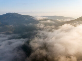 Plakat Morning fog in the Ukrainian Carpathians. Aerial drone view.