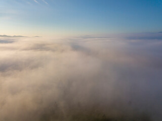 Fototapeta premium Morning fog in the Ukrainian Carpathians. Aerial drone view.