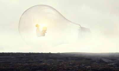 Huge bulb lamps on a grey foggy background