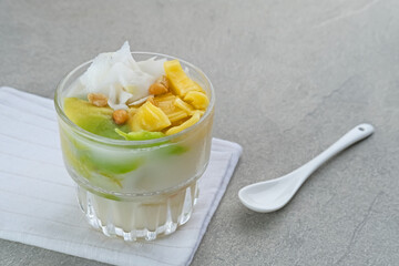 Es teler or es teller is a fruit cocktail from Indonesia, consist of avocado, young coconut, jackfruit, served with coconut milk, sweetened condensed milk. 
