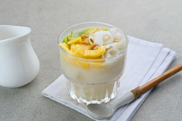 Es teler or es teller is a fruit cocktail from Indonesia, consist of avocado, young coconut, jackfruit, served with coconut milk, sweetened condensed milk. 
