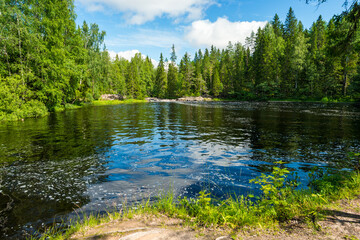 Obraz premium Ruskeala Falls. Wonderful natural park in northern Russia, Republic of Karelia. Not far from the town of Sortavala