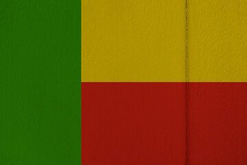 Patriotic wooden background in colors of national flag. Benin