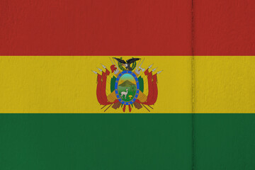 Patriotic wooden background in colors of national flag. Bolivia