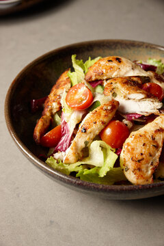 Close up of gourmet chicken ceasar salad