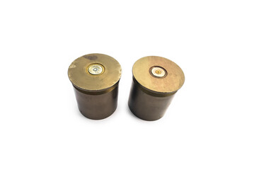 isolated used and old m203 bullet shells on white background, soft and selective focus.