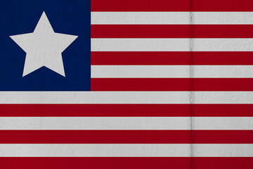 Patriotic wooden background in colors of national flag. Liberia