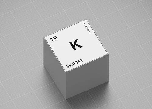 Potassium, element symbol from periodic table on white cube on milimeter paper 3D render orthographic projection view