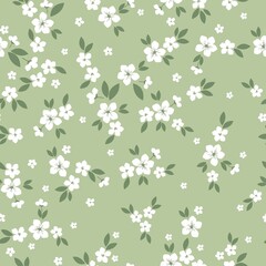 Obraz premium Seamless vintage pattern. white flowers, green leaves. light green background. vector texture. fashionable print for textiles, wallpaper and packaging.