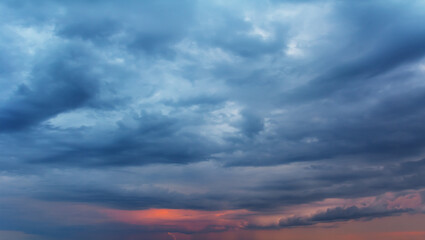 sunset over dramatic cloudy sky natural background