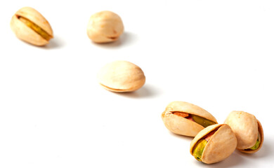  pistachio nuts isolated on white