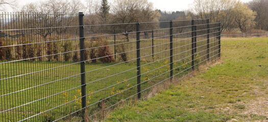 a garden fence made of metal