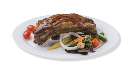 Barbeque pork spare rib served with mixed vegetables in white plate