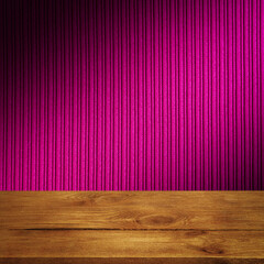 The background is blank wooden boards and a textured striped wall with gradient lighting and...