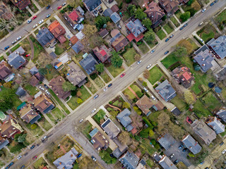 Top view of house roofs on parallel streets in a old east coast neighborhood of Squirrel Hill, Pittsburgh, Pennsylvania. Diagonal street.