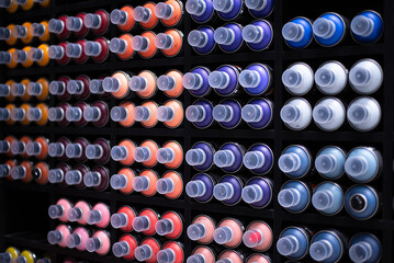 graffiti spray. a huge assortment of colors for street art on the shelves in the store