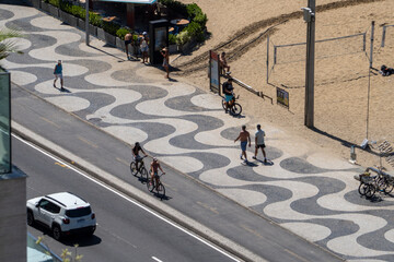 Fototapeta premium Sunset at Copacabana Boardwalk, Rio de Janeiro, Brazil