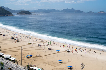 Fototapeta na wymiar Sunset at Copacabana Beach Boardwalk, Rio de Janeiro, Brazil
