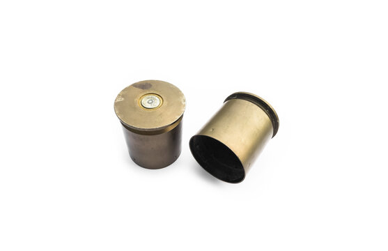 isolated used and old m203 bullet shells on white background, soft and selective focus.
