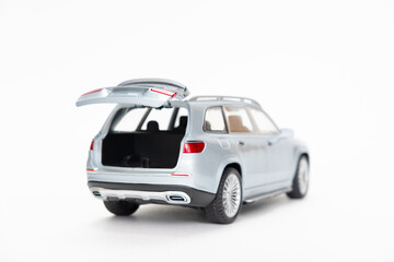 Small grey toy car. Classic car. car isolated on white background.