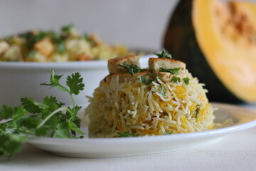Pumpkin cottage cheese rice. One pot rice preparation with basmati rice, grated pumpkin and spices, tossed with pan fried cottage cheese cubes.