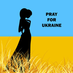 A girl prays for peace in Ukraine.