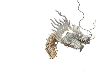 white stucco dragon is a delicate sculpture and art created by the Chinese as a mythical creature or in Chinese literature on a white background.