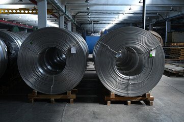 Coils of aluminum wire in production