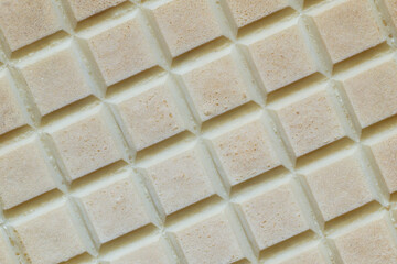 Biscuit wafer with a clearly visible surface. Seamless squares waffle pattern for food background or banner
