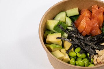 fresh food with salmon, green beans, rice, peanuts, cucumber and seaweed