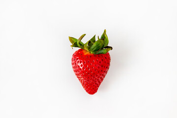 one strawberry on a white background, isolate