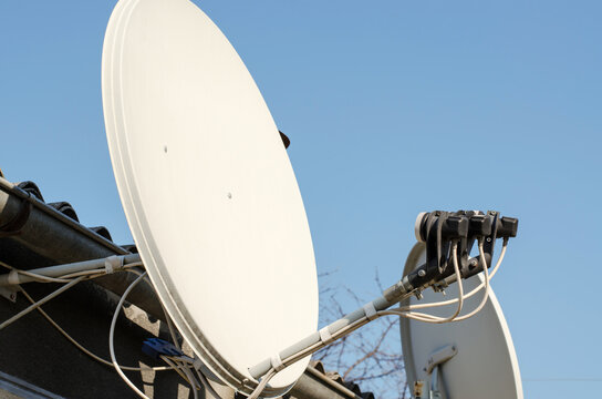 Satellite TV Antenna On A Private House, Close-up