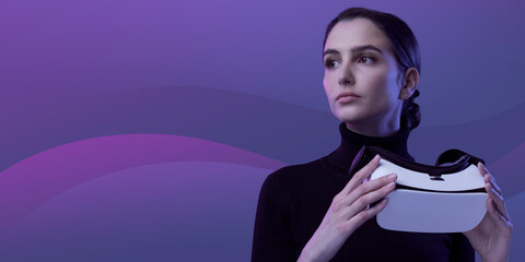 Woman holding a VR headset
