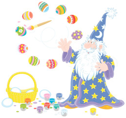 Old wizard with a big white beard coloring and decorating Easter gift eggs with a magic flying paintbrush and bright paints, vector cartoon illustration isolated on a white background