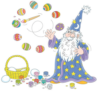 Old wizard with a big white beard coloring and decorating Easter gift eggs with a magic flying paintbrush and bright paints, vector cartoon illustration isolated on a white background