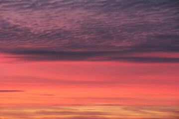 Sunset with clouds. Gentle shades of pink.