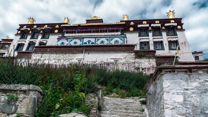 Fototapeta na wymiar Ganden Monastery located at the top of Wangbur Mountain is one of the 
