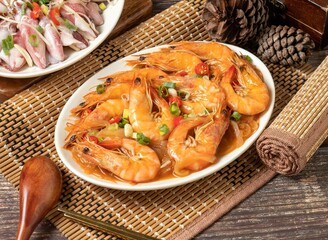 deep-fried Shrimp in a dish isolated on mat side view on dark wooden table taiwan food