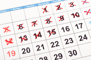 Red cross mark on the calendar