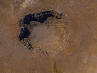 Crater landscape on Reykjanes Peninsula of Iceland. Brown sand on earth surface with sandy path....