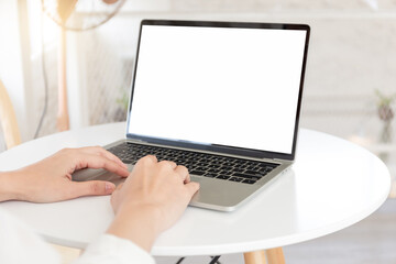 computer screen blank mockup.hand woman work using laptop with white background for advertising,contact business search information on desk at coffee shop.marketing and creative design