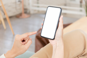 cell phone blank white screen mockup.hand holding texting using mobile on desk at office.background empty space for advertise.work people contact marketing business,technology