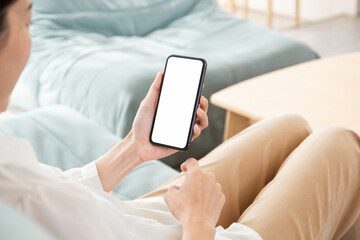 cell phone blank white screen mockup.hand holding texting using mobile on desk at office.background empty space for advertise.work people contact marketing business,technology