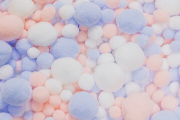 White, pink and blue soft pompons.
