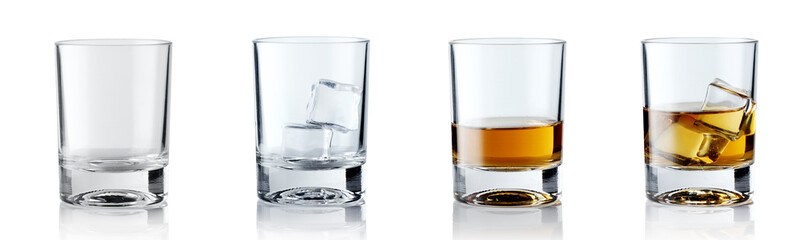 Set of alcoholic beverages. Scotch whiskey in elegant glass with ice cubes on white background.