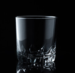 Glass of water or whiskey and wine. Empty glass for alcoholic beverages on black background.
